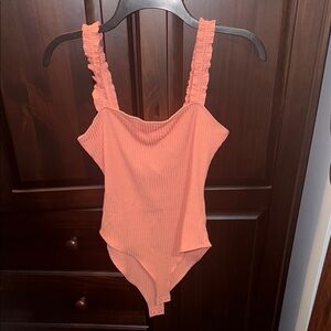 Ruffled Coral Body Suit